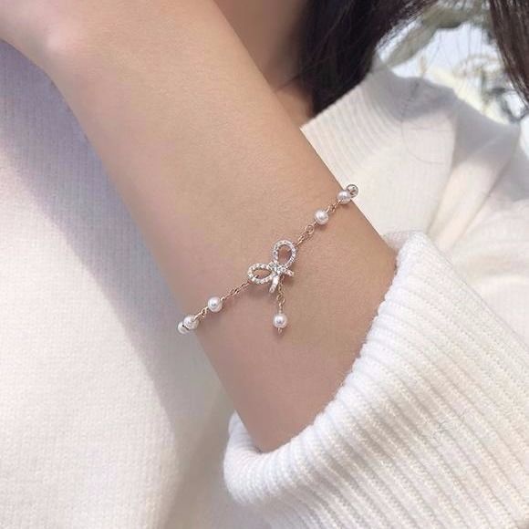 Vòng Tay Mạ Vàng Hình Nơ Đính Ngọc Trai Giả Xinh Xắn Cho Nữ