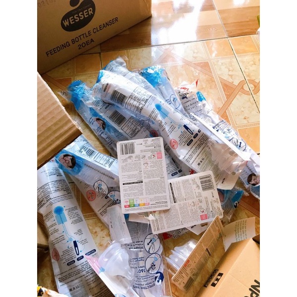 Cây rửa bình sữa và núm ti Pigeon hàng nhập, tay xoay 2 chiều