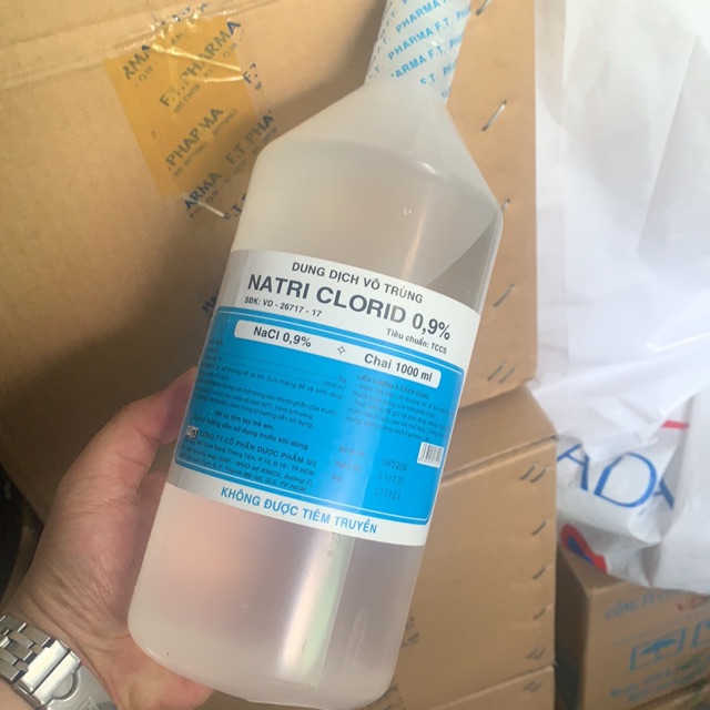Dung dịch nước muối vô trùng natri clorid 0,9% 3/2 (FT Pharma) chai 1000ml /1 lít (súc miệng, họng, rửa mặt, vết thương)