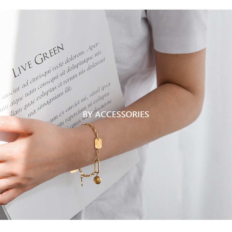 Lắc tay nữ unisex titan xích phối mặt cười made for you không gỉ