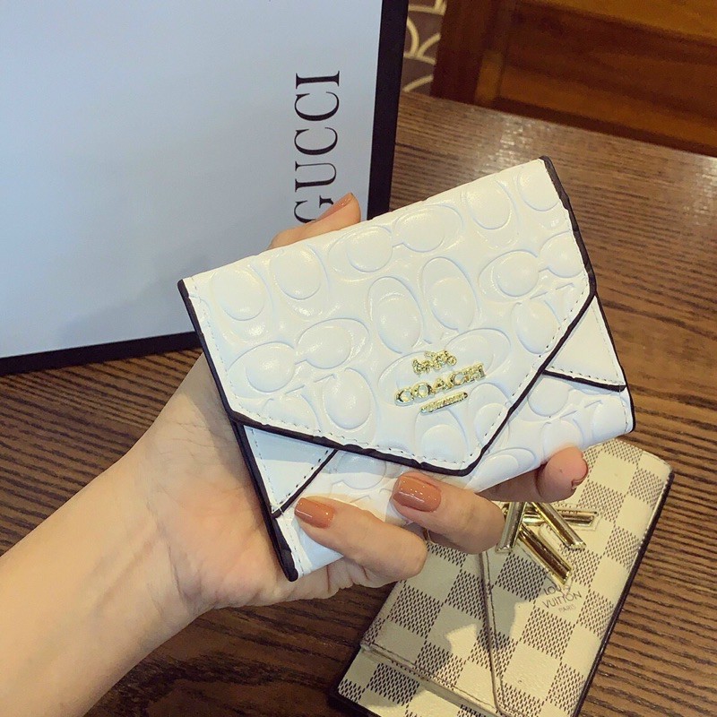 Ví COACH cầm tay