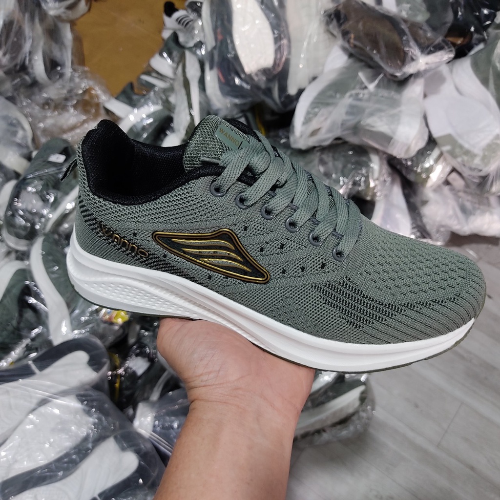 (BẢO HÀNH 1 NĂM) Giày thể thao sneaker nam cao cấp Wanno xám viền chữ cam