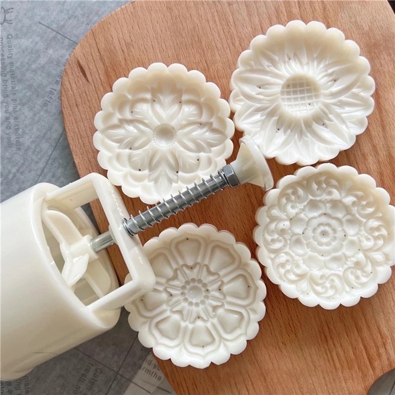 Khuôn trung thu lò xò 4 mặt hoa 150g/200g năm 2022