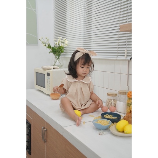 Đồ bộ liền thân + băng đô nơ cổ ren em bé Nanci room