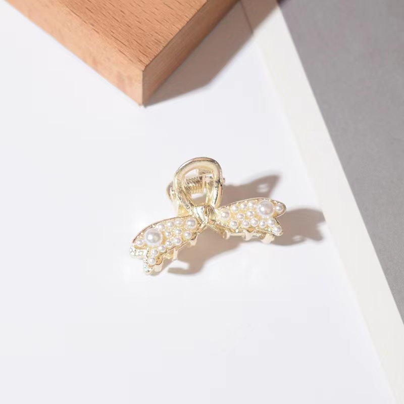 Kẹp tóc nơ đính ngọc trai dễ thương