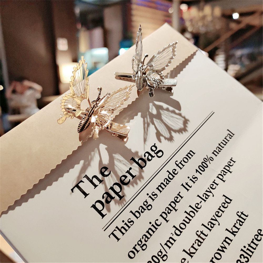 Kẹp tóc hình bướm bằng hợp kim phối tua rua phong cách cổ điển cho nữ