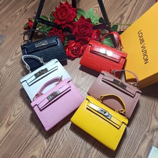 Túi xách mini da rắn hđ