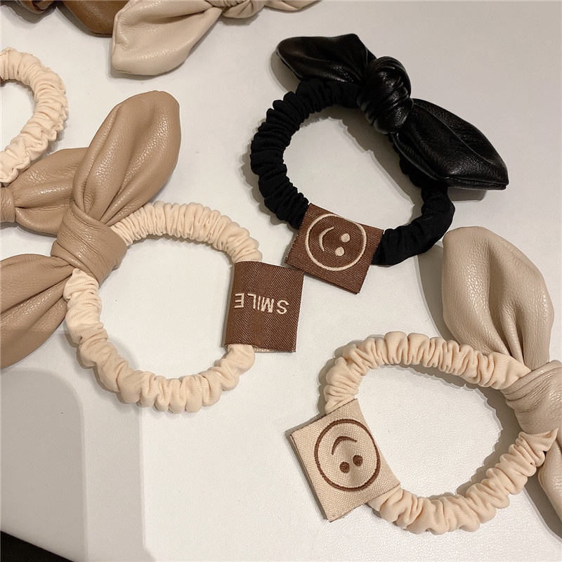 Băng đô da đính nơ đơn giản cho nữ