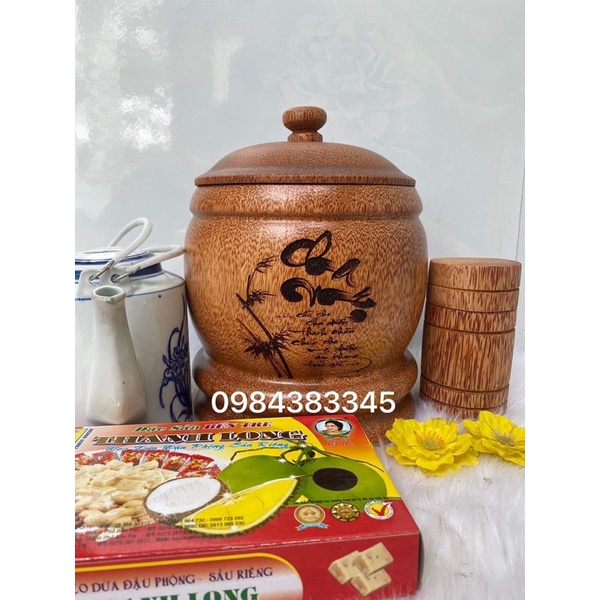 vỏ bình giữ nhiệt ấm trà bằng gỗ dừa nguyên khối của bến tre .