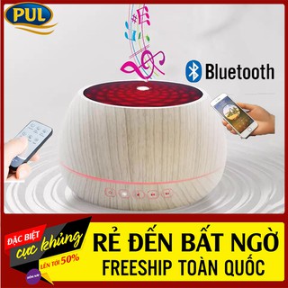 Máy xông tinh dầu phun sương siêu âm trụ cao cấp 1000ml tích hợp loa bluetooth