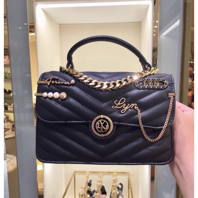Túi lyn lady tophand khoá tròn huy hiệu