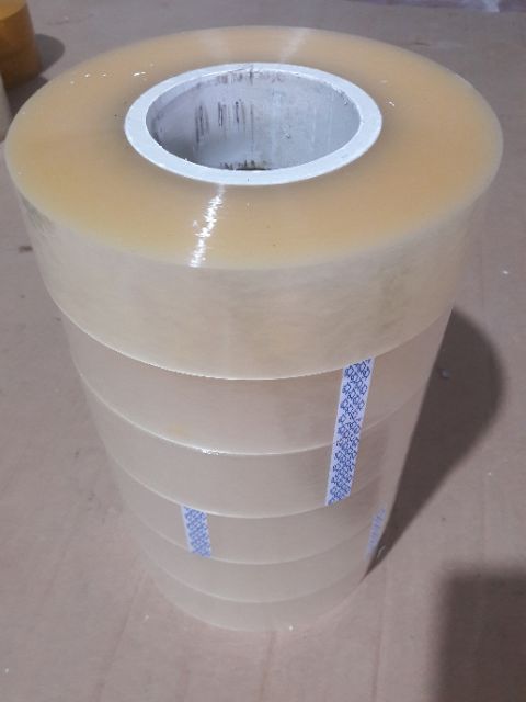 Băng dính 1kg lõi nhựa màu trắng trong