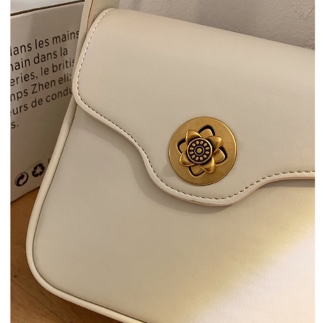 Túi xách thiết kế cao cấp khoá cài bông hoa - HAKEN