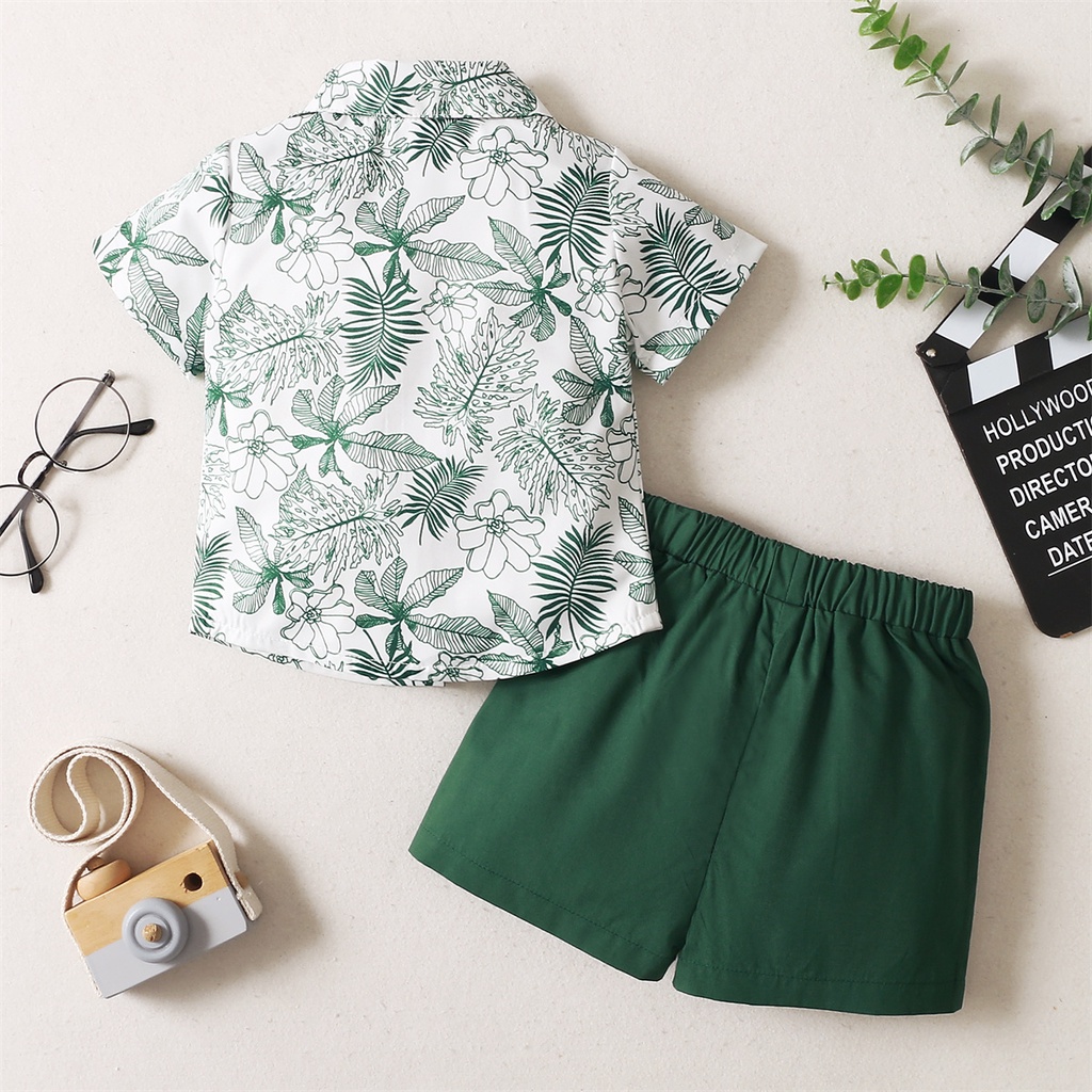 Set đồ 2 món MIKRDOO gồm áo sơ mi tay ngắn in họa tiết hoa và quần ngắn kẻ sọc cho bé trai 1-5 tuổi