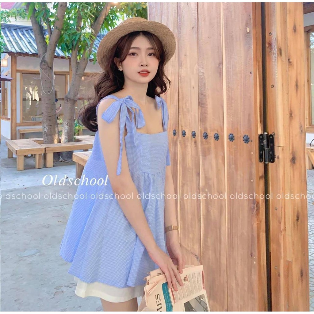 Set áo babydoll 2 dây buộc nơ caro kèm quần đùi kaki ống rộng màu trắng GUU