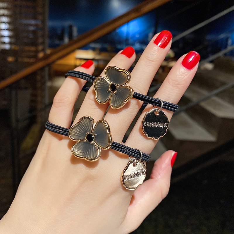 Dây buộc tóc co giãn mặt hình cỏ ba lá thời trang dành cho nữ