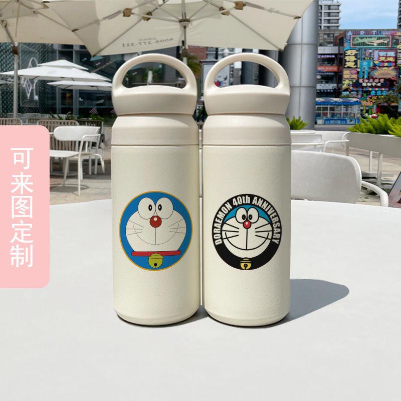 Bình Nước Giữ Nhiệt Cầm Tay Hình Mèo Máy Doraemon Dễ Thương Cùng Kích Thước Nhỏ Gọn Sáng Tạo Xu Hướng Cho Bé Trai Và Bé Gái