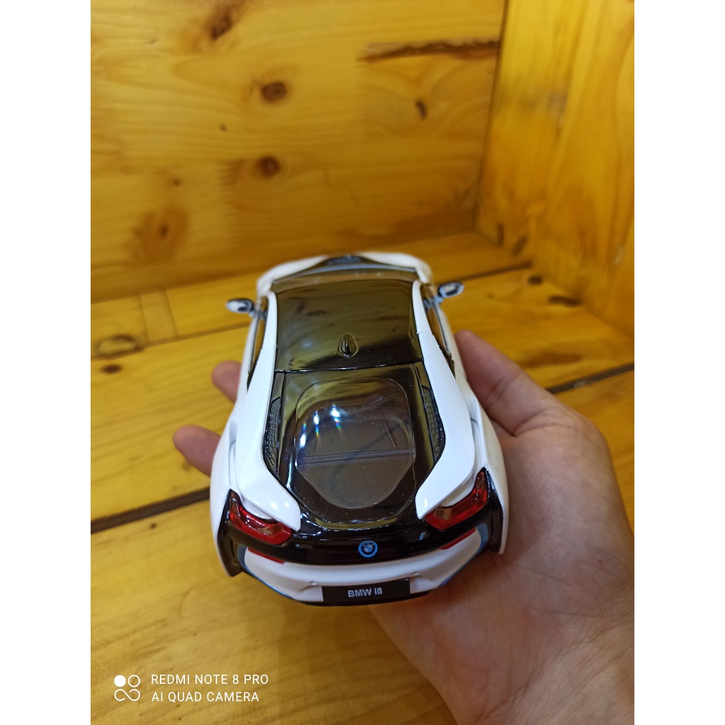 Mô hình xe ô tô siêu xe BMW I8 Hãng Rastar tỉ lệ 1:24 màu trắng, vỏ hợp kim, mở được cửa