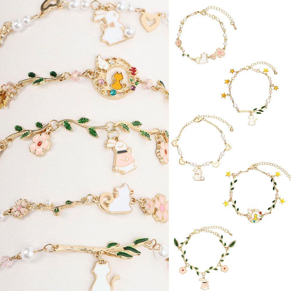 Vòng Tay Chuỗi Hạt Ngọc Trai Mặt Hình Thỏ Và Hoa Lá Dễ Thương Cho Nữ