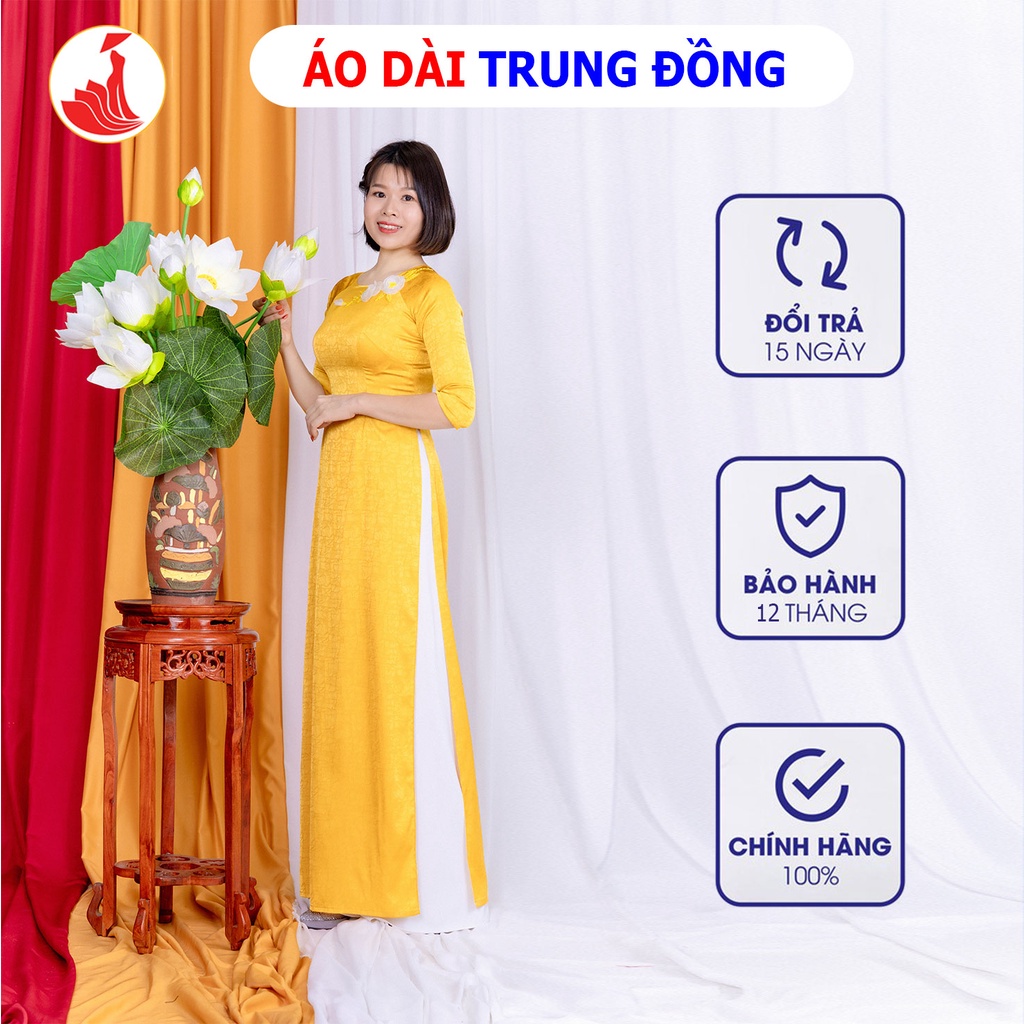 Áo dài đẹp chất liệu gấm cao cấp kết hoa ngực cổ thuyền màu vàng | Áo dài Trung Đồng.