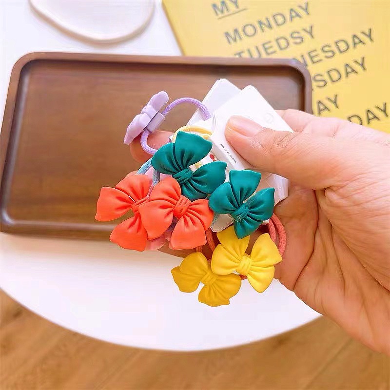 Dây Cột Tóc Co Giãn Đính Nơ Màu Kẹo Dễ Thương Cho Bé Gái