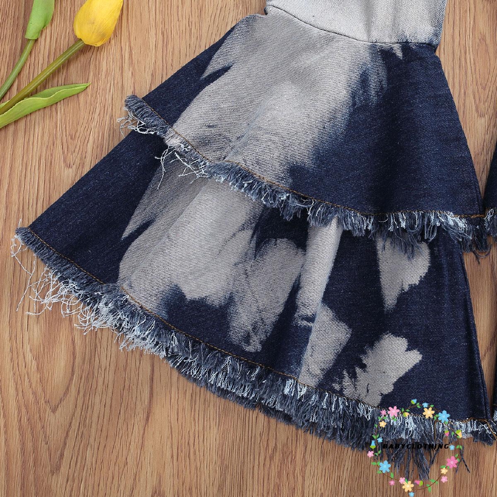 Quần denim dài ống loe bèo nhún phối rách lỗ thời trang cho bé gái