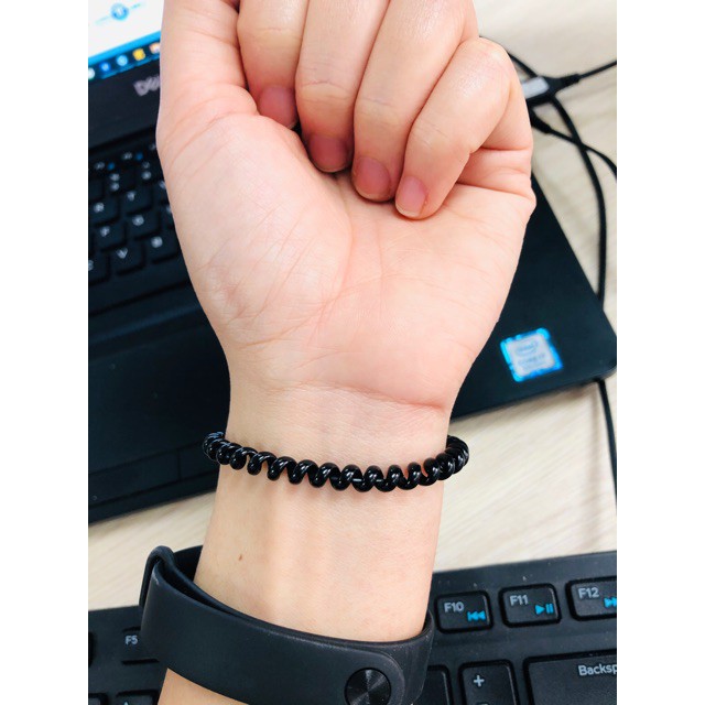cột tóc lò xo
