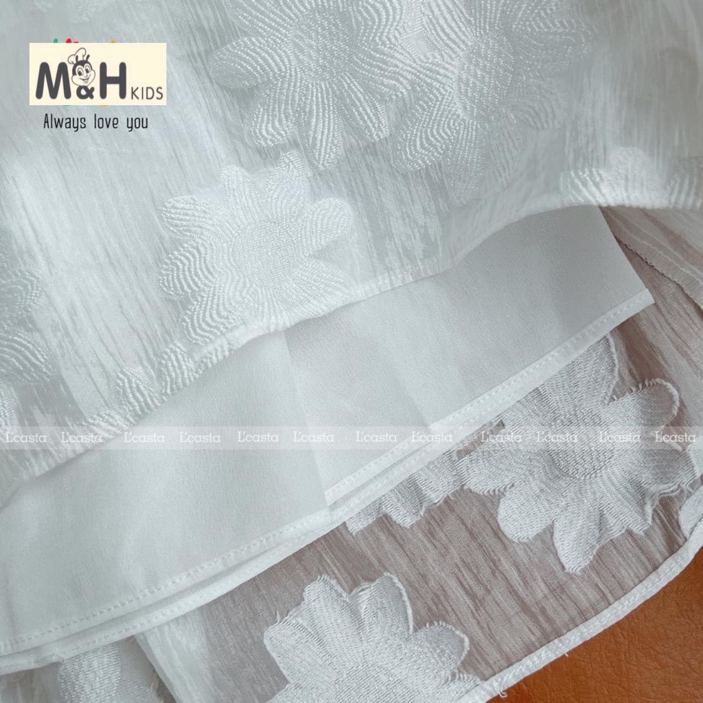 Váy trắng công chúa tay bồng cho bé 10-25kg. Chất liệu gấm hoa cao cấp, lớp lót lụa siêu mát, gắn nơ sau lưng siêu xinh