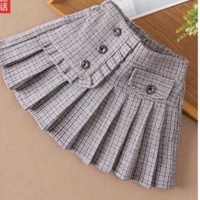 Chân váy xếp  ly bé gái đáp bèo 3 cúc cv014