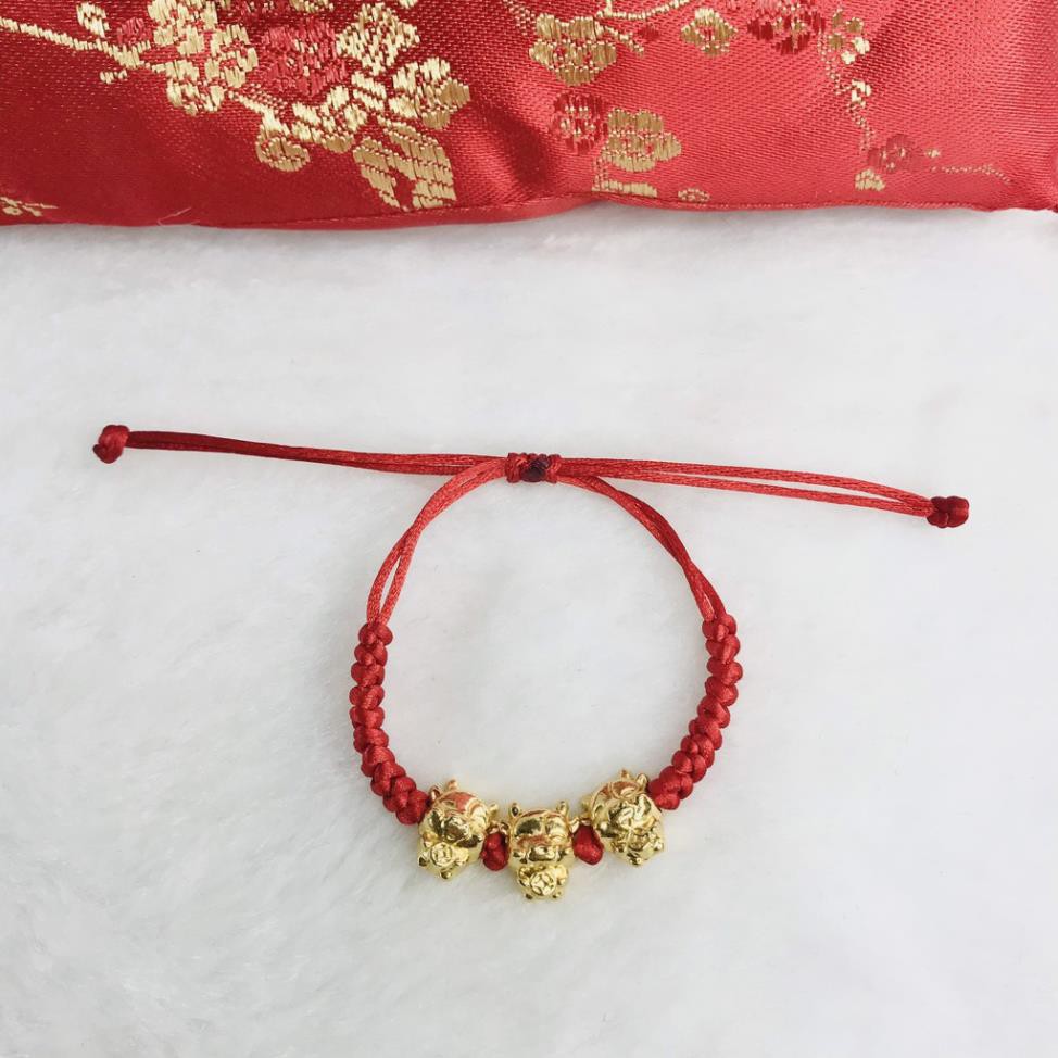 Vòng tay chỉ đỏ trâu vàng rước lộc may mắn