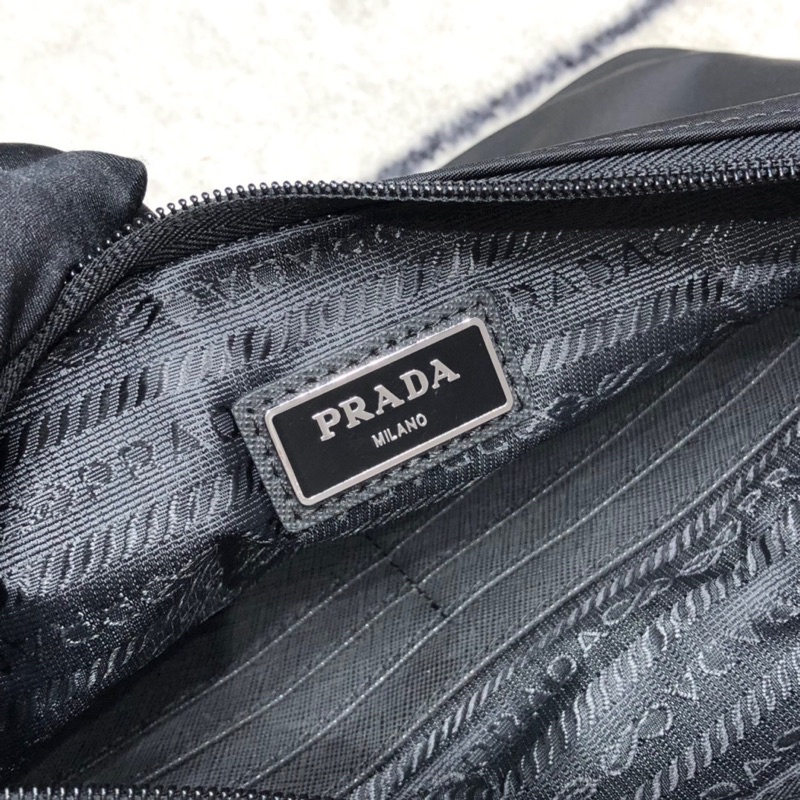 Clutch cầm tay cho nam thương hiệu thời trang cao cấp Prada chất liệu vải chống nước