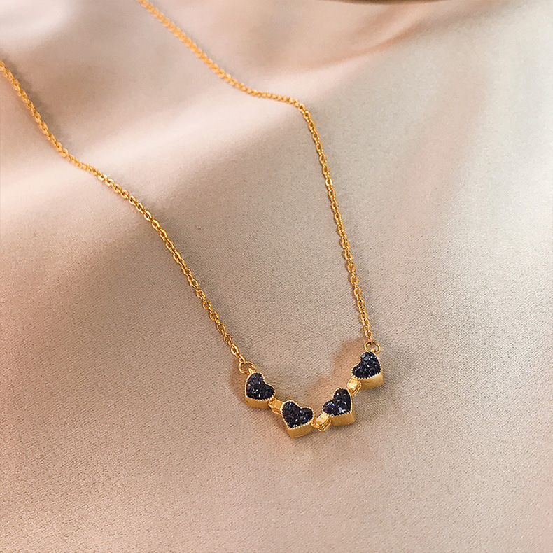 Korean version of the full diamond four-leaf clover foldable pendant 18K rose gold titanium steel female necklace