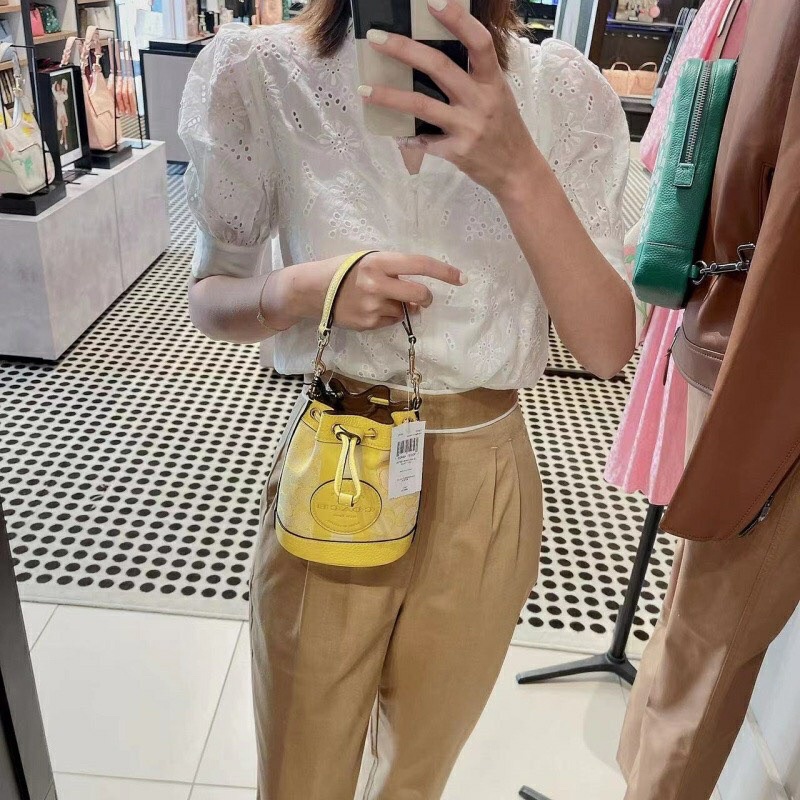 HÀNG XUÂT DƯ XỊN_Túi Coach bucket sang xịn trẻ trung 3 màu, da thật phối canvas check code được