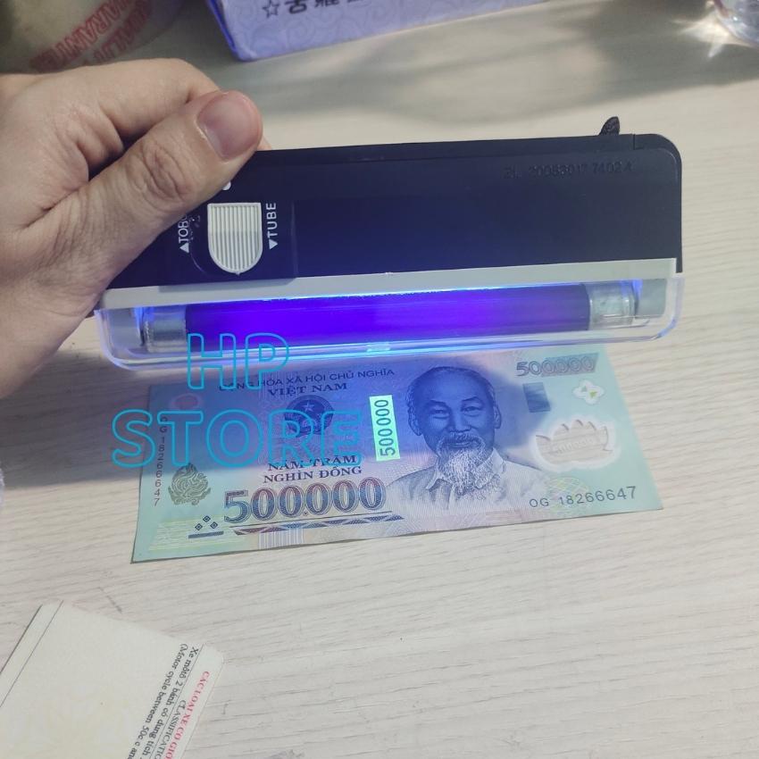 Đèn mini cầm tay soi tiền giả, giấy tờ, cà vẹt, bằng lái xe, tem, vé số bằng tia cực tím, nhỏ gọn tiện ích