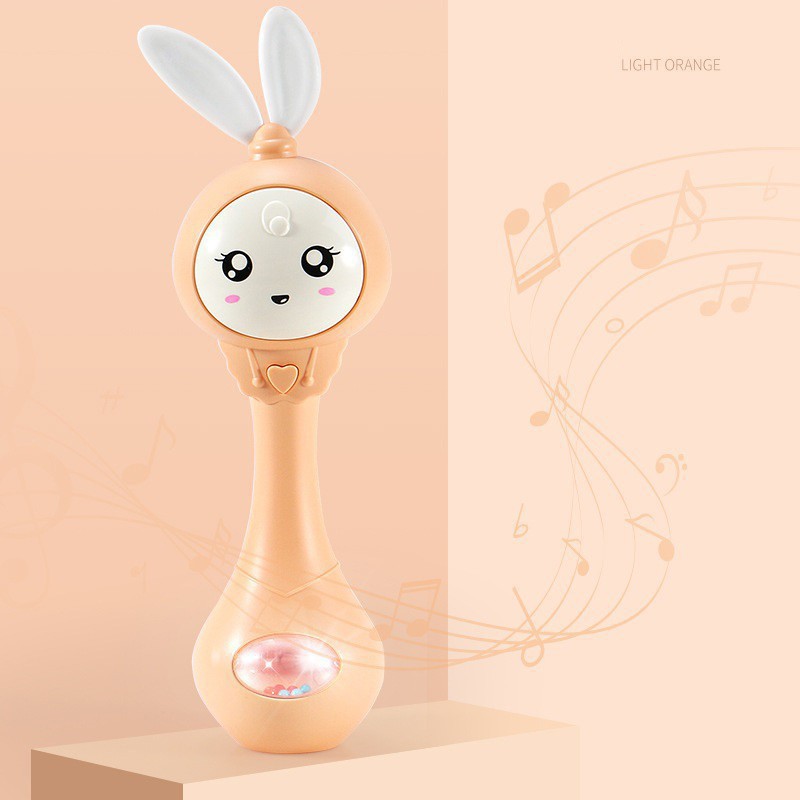 Đồ chơi trống lắc cầm tay silicon hình thỏ có đèn và nhạc dễ thương và vui nhộn cho bé