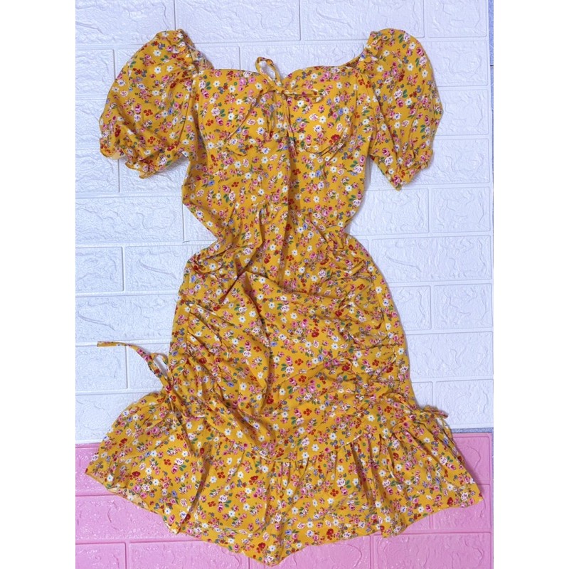 Đầm body hoạ tiết hoa nhí phối dây nơ hai bên, có kèm mút ngực