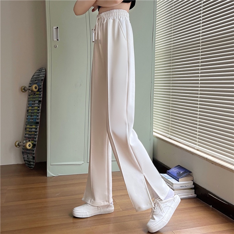 Quần dài dáng rộng lưng cao với thiết kế xẻ tà phối dây rút thời trang cá tính