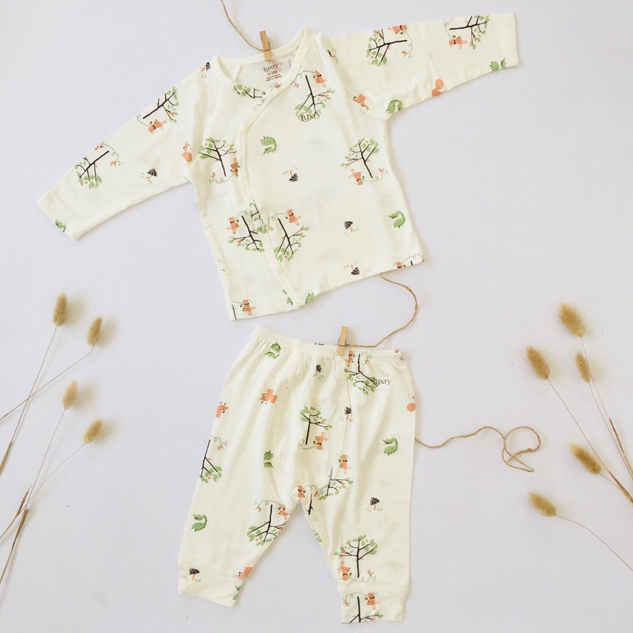 Bộ dài tay cài lệch họa tiết cute cho trẻ sơ sinh với chất vải sợi tre Luxry mềm mịn