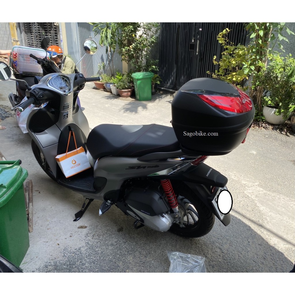 Thùng xe Sh mode , thùng givi E250N kèm đế và kit gắn trên cảng zin xe SH , hàng Givi chính hãng, bảo hành 2 năm