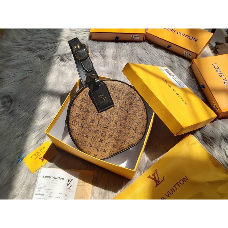 Túi quai xách tròn khoá bấm