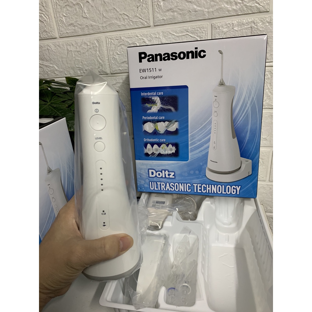 Máy tăm nước Panasonic EW1511 làm sạch răng và nướu với công nghệ siêu âm