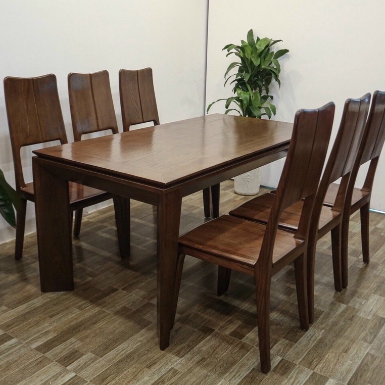 Bàn ăn mặt gỗ chân vát