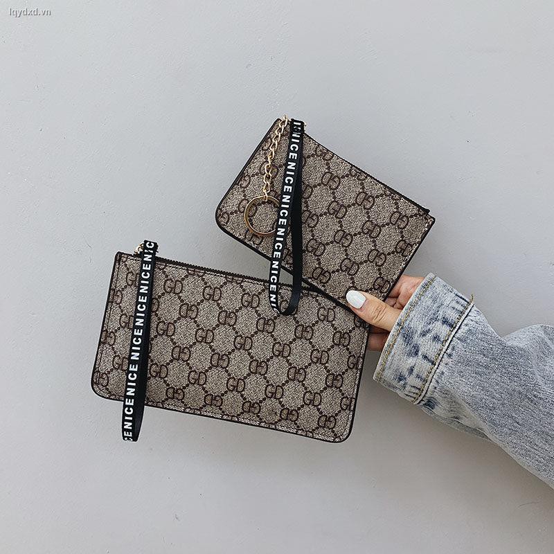 New 7-inch large mobile phone bag, European and American women s clutch female wallet, long zipper, capacity, ultra-thin wrist bag