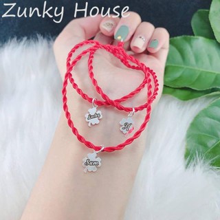 Vòng tay chỉ đỏ cỏ 4 lá khắc chữ