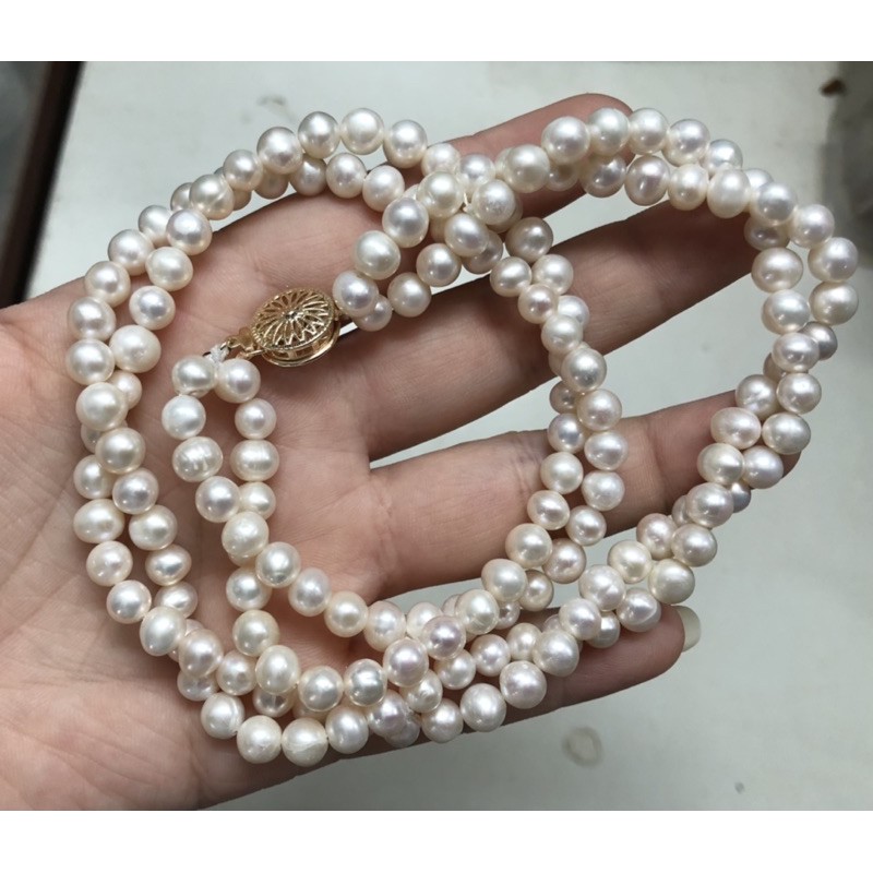 Vòng cổ hạt đan xoắn màu trắng