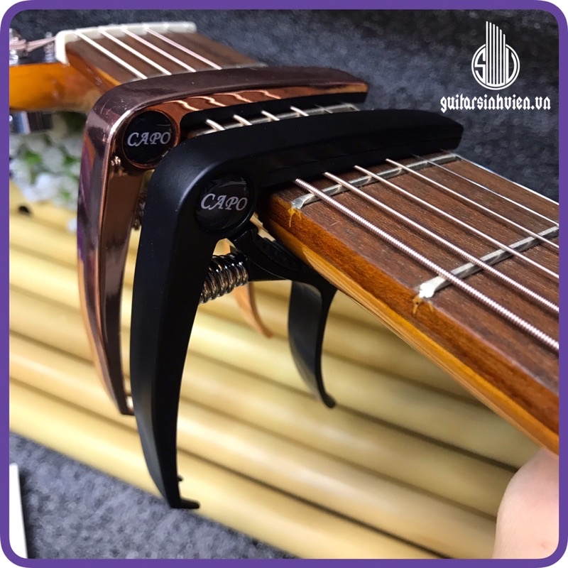 Capo guitar nguyên khối, có móc nhổ chốt gym - Capo 2 tác dụng cho guitar - tặng 1 pick khi đặt hàng