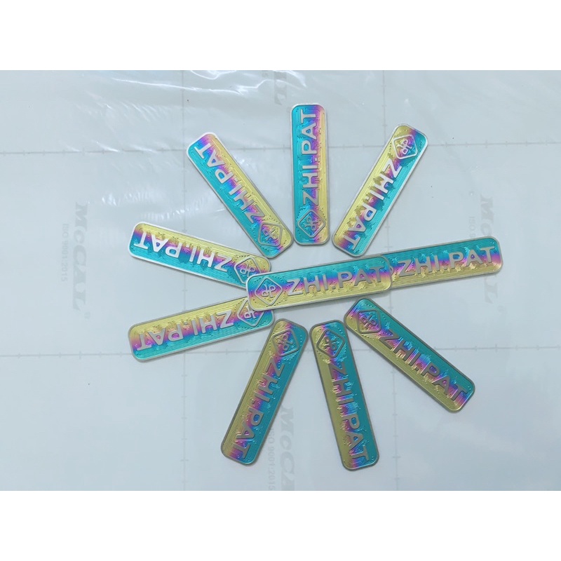 (Giá Đặc Biệt) LôGô Titan ZinPat Có Sẵn Keo 3M Gắn Nhiều Vị Trí Trên Xe