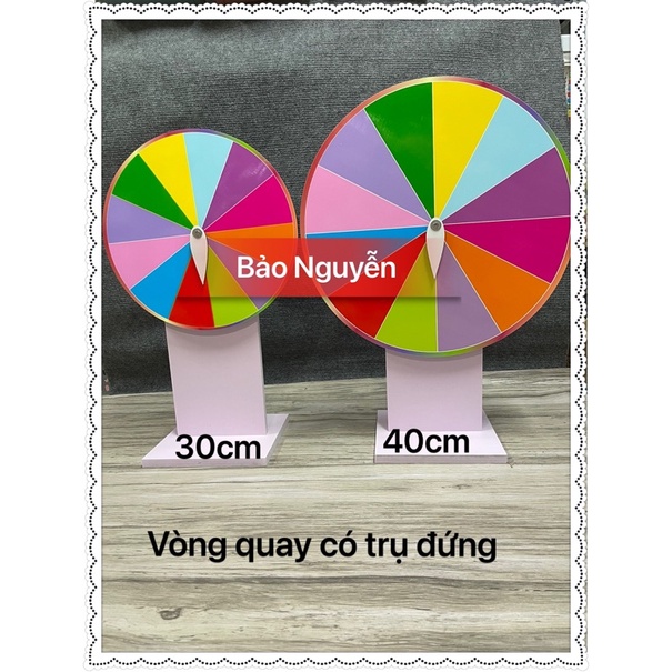 VÒNG QUAY NÓN KỲ DIỆU TRỤ ĐỨNG