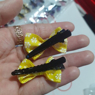 Một cặp kẹp tóc mỏ vịt đính nơ cho bé (Được chọn màu)