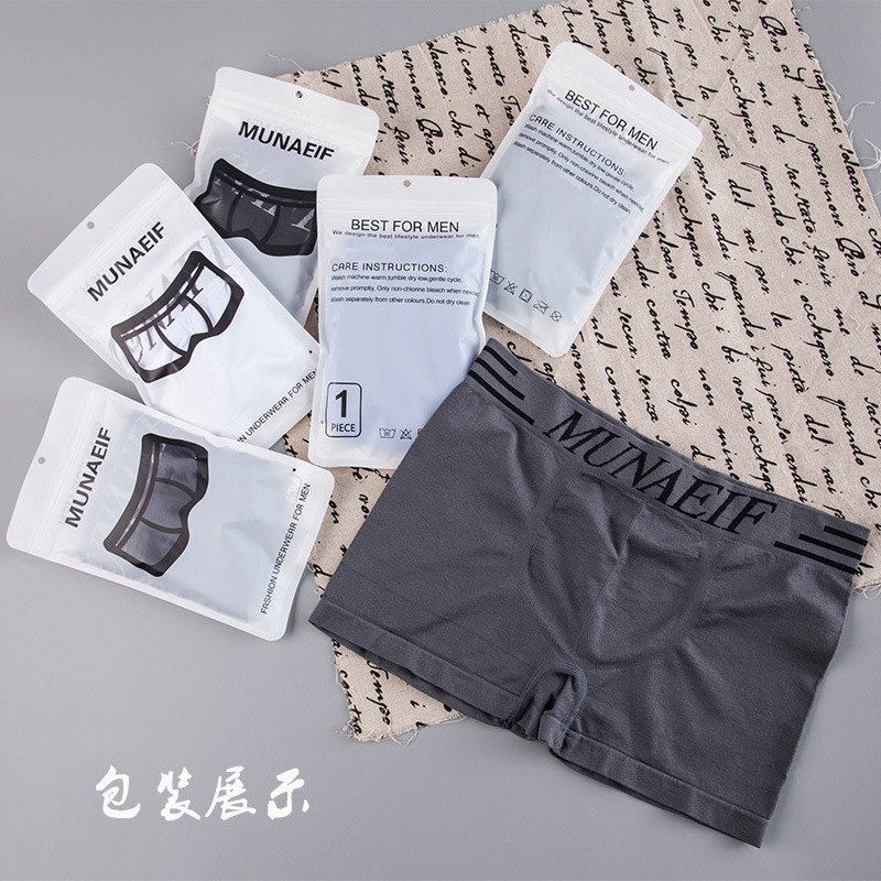 Quần lót boxer thiết kế không đường may in chữ tiếng Anh phong cách thể thao thời trang cho nam